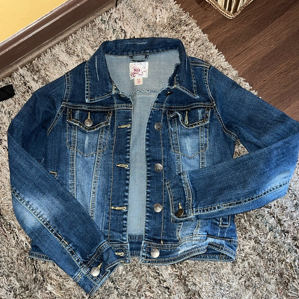 Selling size 14 beautiful jean jacket in great conditions
